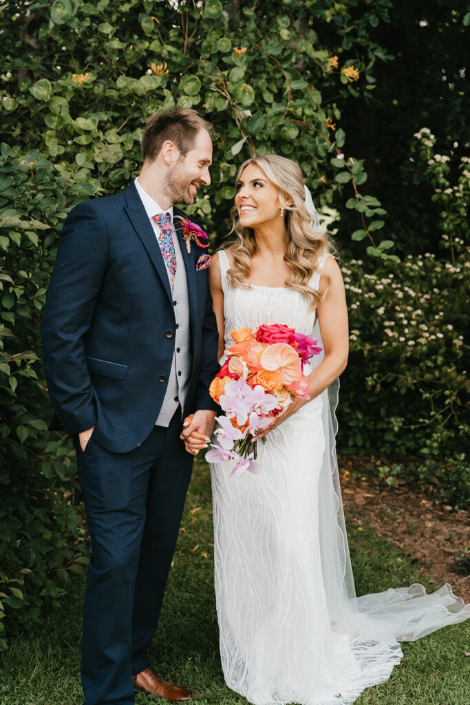 young couple getting married looking longingly into each other's eyes